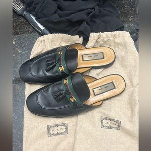 Men Gucci loafers.